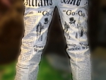 Мужские джинсы с принтом газеты